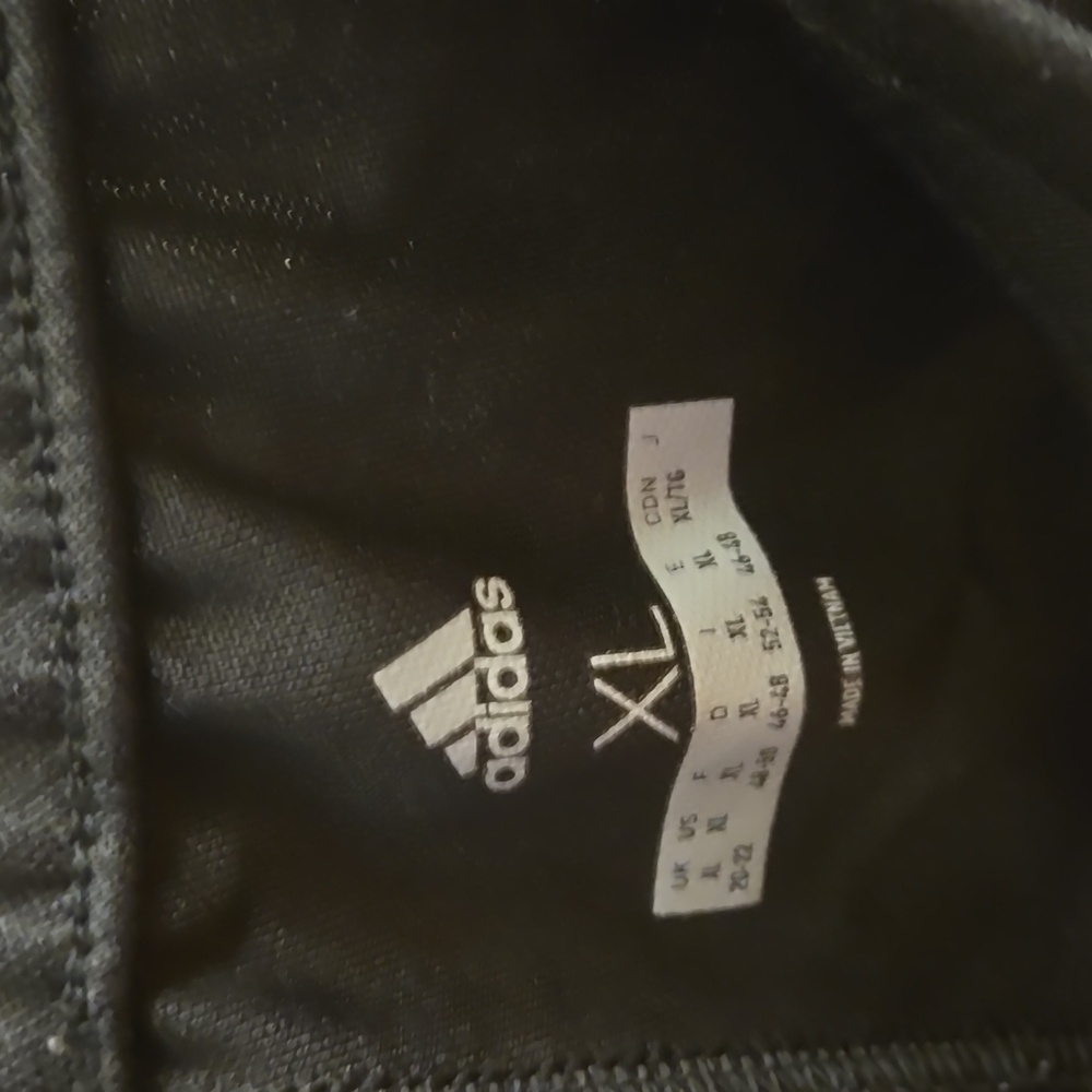 Adidas women's black pants with beautiful pinkish design. Size XL